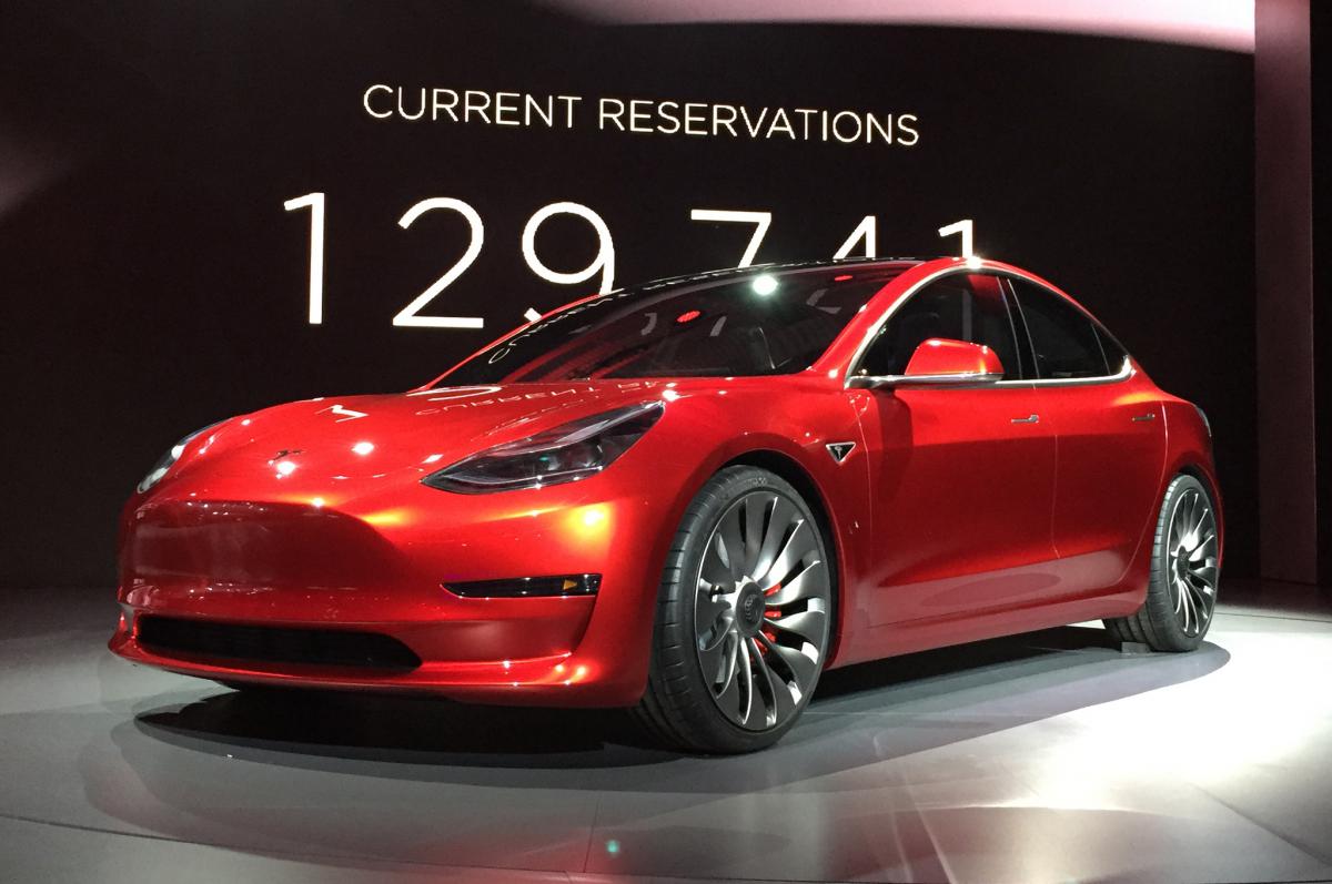 Tesla-model-3-on-stage-in-red